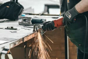 Welder subcontractor on construction site