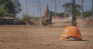GC hardhat at a worksite, foreshadowing the need for a certificate of insurance checklist for subs